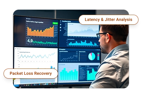 Professional analyzing WebRTC performance data on multiple screens